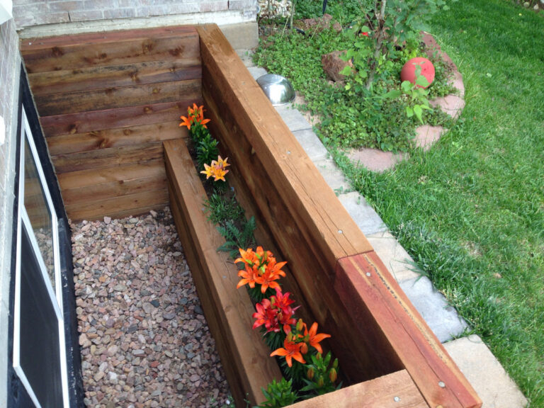 Timber Window Wells with flower box in Denver, Colorado