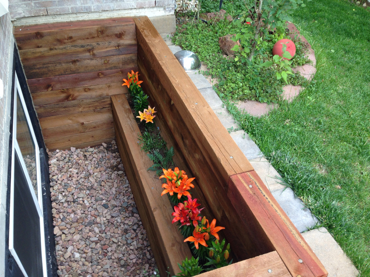 Timber Window Wells with flower box in Denver, Colorado