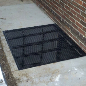 Metal Grate Installed Over Window Well