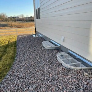 Expert installation of window wells, covers, grates, & ladders