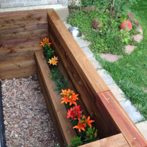 Timber Window Wells with flower box in Denver, Colorado